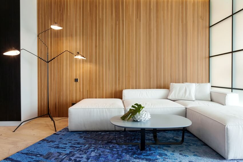 modern wooden wall panels behind couch in livingroom
